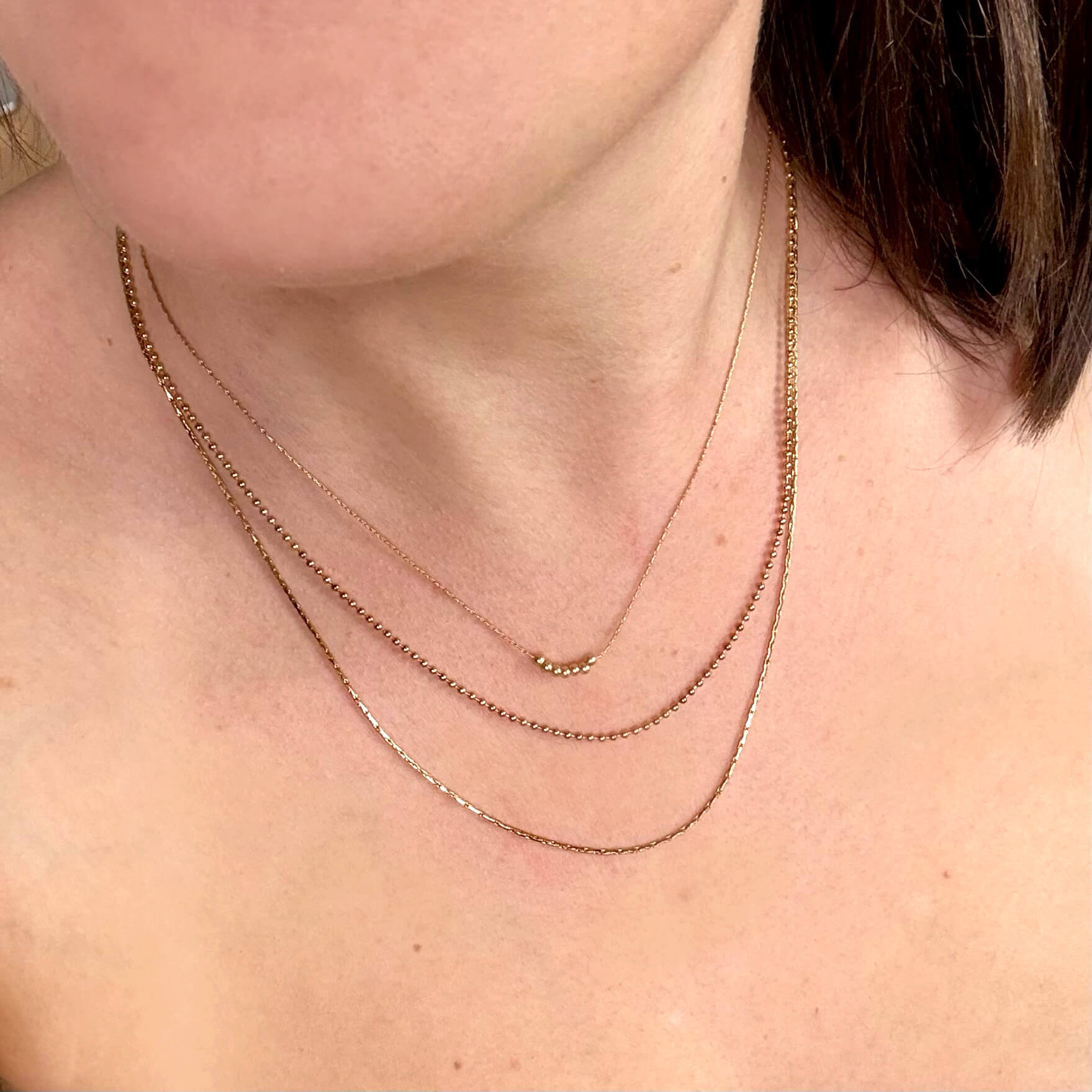 Triple collier perles dorées Will